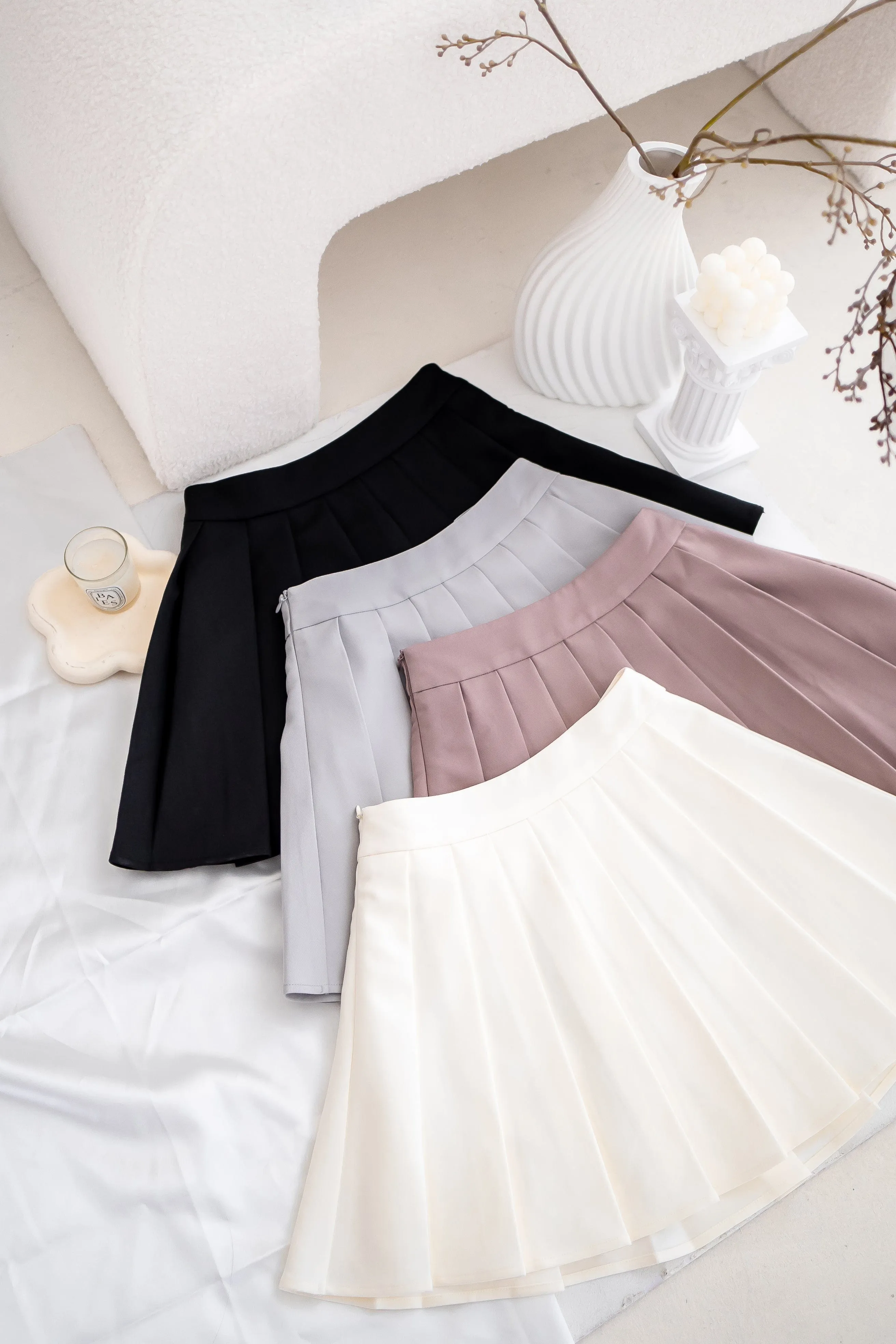 CAMU PLEATED SKIRT IN MAUVE